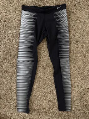 NWT NIKE Reflective Running Leggings